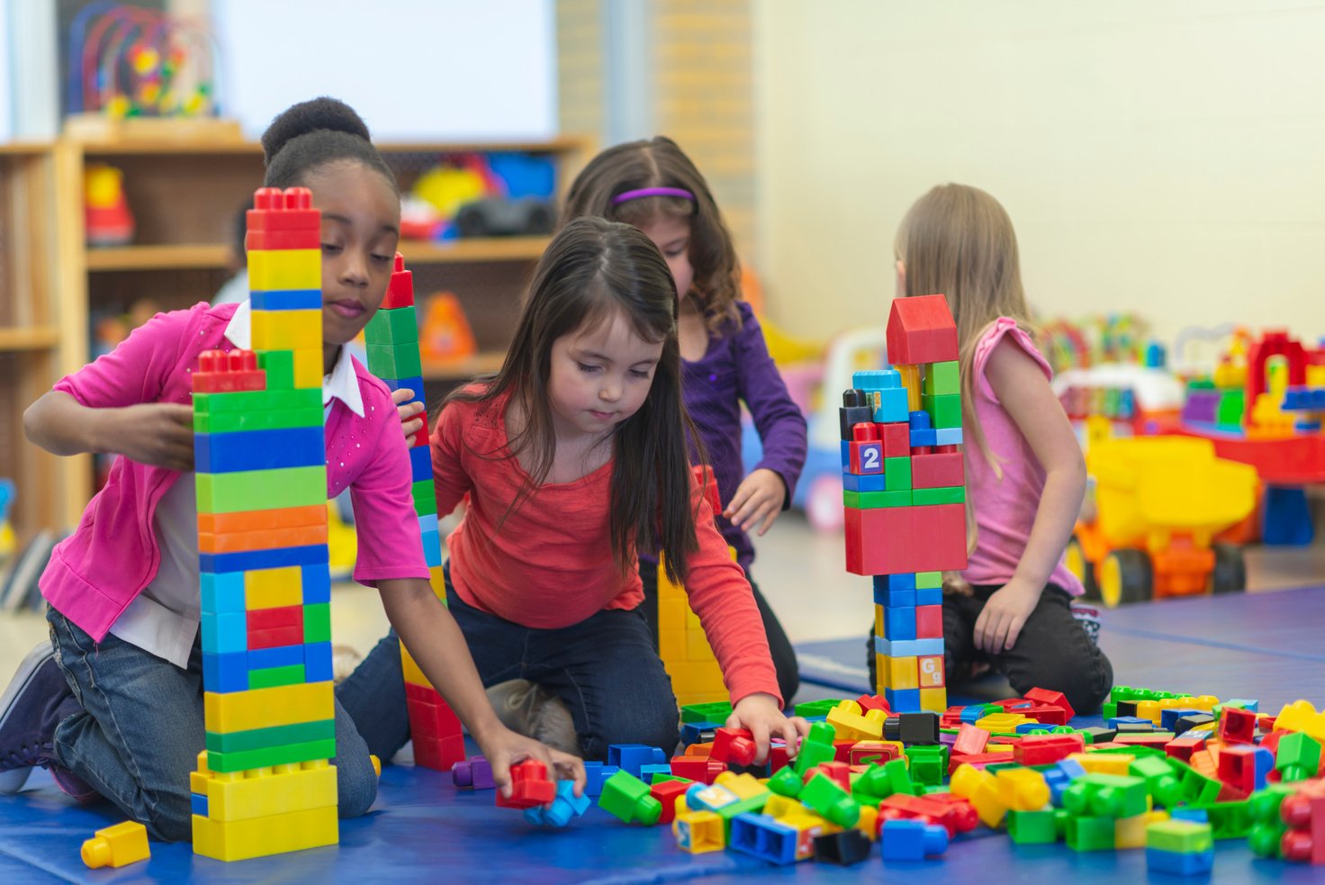 Kids playing with building blocks